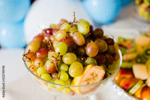 Fototapeta Naklejka Na Ścianę i Meble -  Sliced ​​fruits on a buffet table