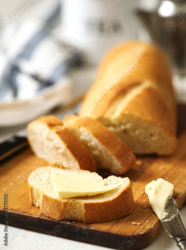 Butter on a fresh crunchy bread.