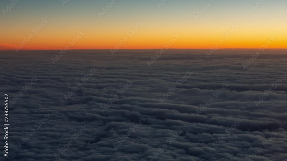 Sunset aerial flying over a blanket of clouds Sunset aerial flying over a blanket of clouds