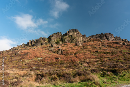 Hen Cloud against a beautiful blue sky at the Roaches, Staffordshire in the Peak District National park.
