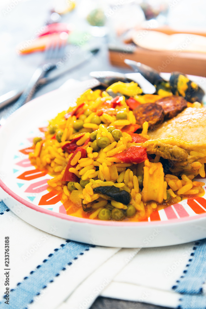 Paella with chicken, seafood and chorizo