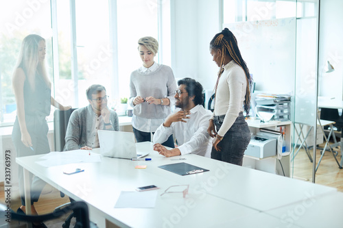 Fotografie multi racial team with common ideas for start up business, modern business for a