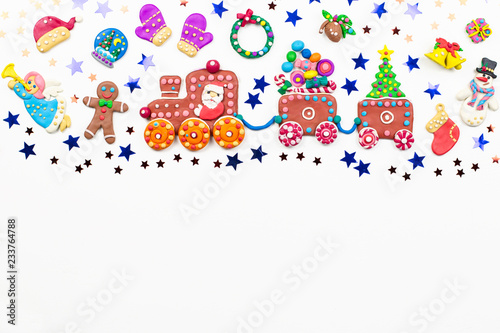 Merry Christmas greeting card with decorations. Santa  Christmas train with tree and sweets  snowman  reindeer and gifts