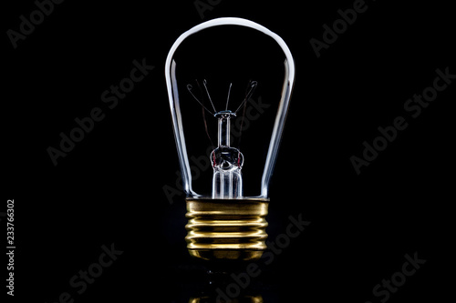 Light bulb on black background