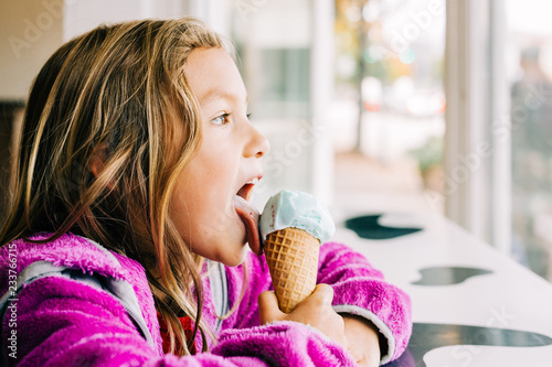 Smiling Girl With Ice Cream Cone