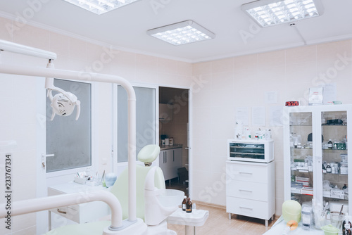 Dental clinic interior. Dentistry  medicine and stomatology concept. White tone.