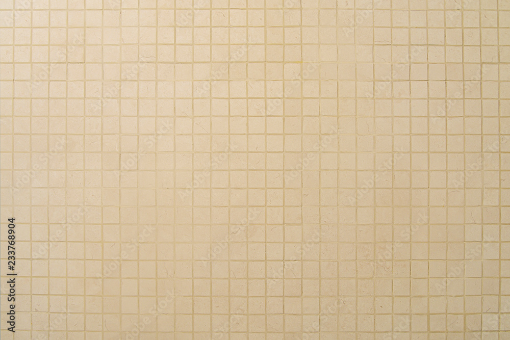 Old beige mosaic wall background texture Old beige mosaic wall background texture
