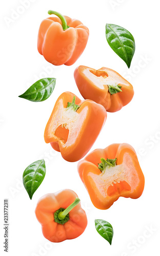 Flying peppers isolated on white background. Clipping path