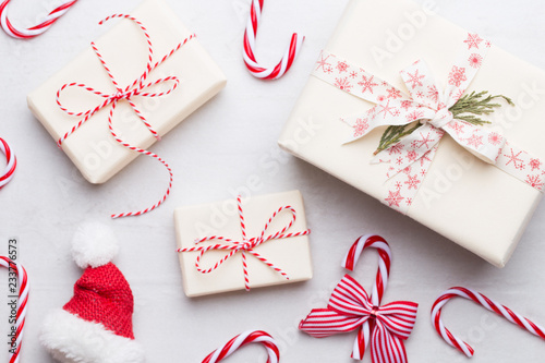 Christmas composition. Gifts, stars decorations on white background. Christmas, winter, new year concept. Flat lay, top view, copy space.