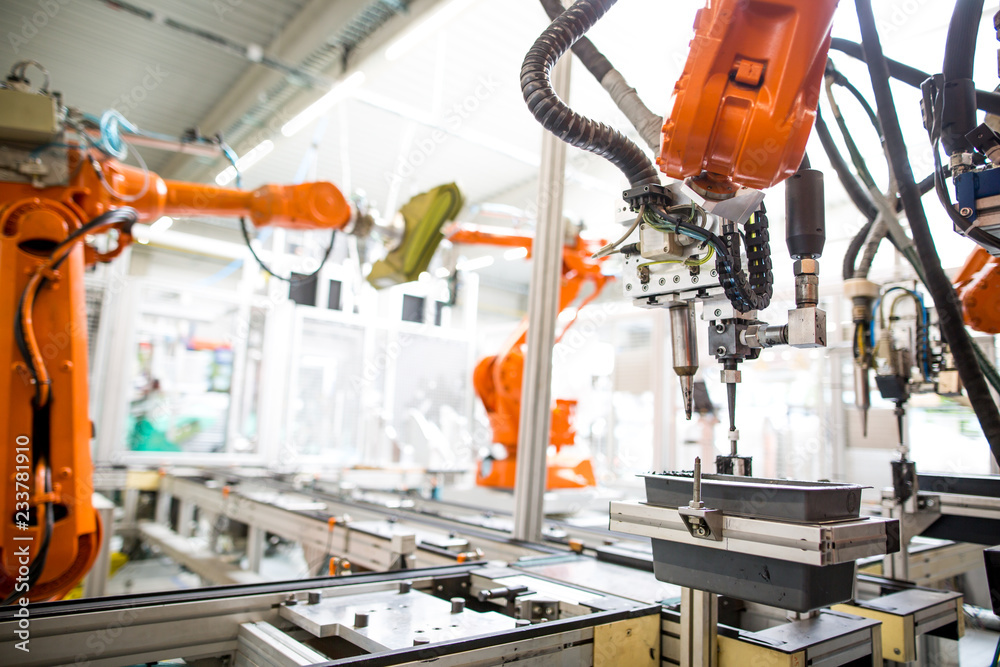 Industrial automatic robot arms in the production line, inteligent factory industry Industrial automatic robot arms in the production line, inteligent factory industry