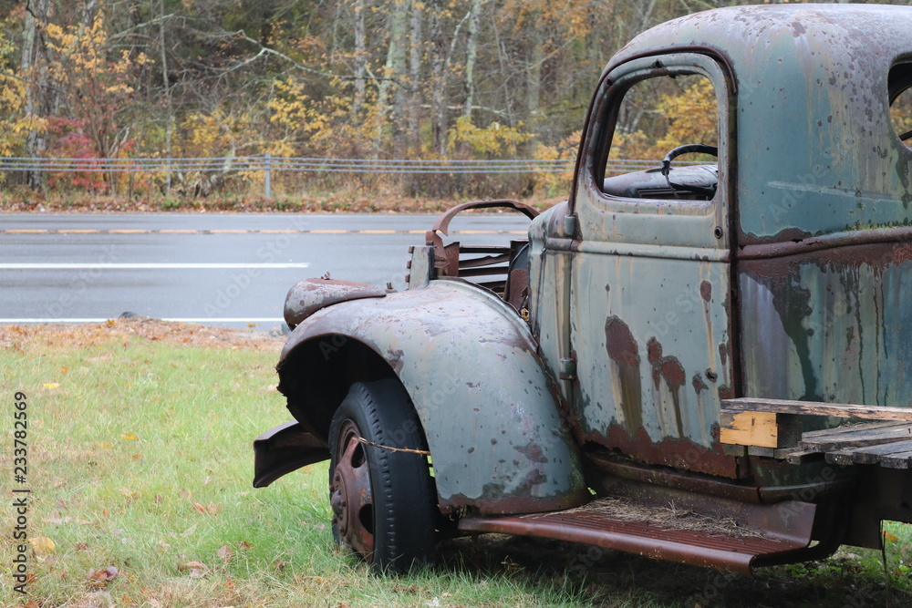 Old rusty antique truck on roadside Old rusty antique truck on roadside