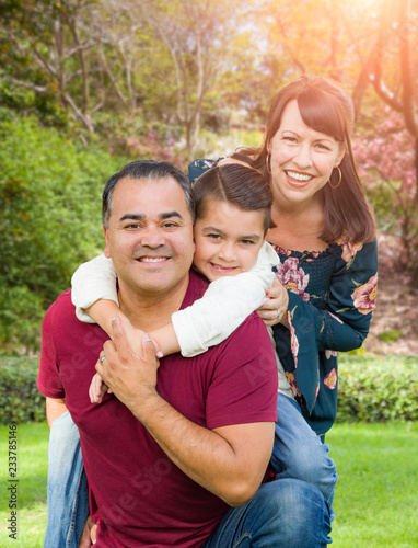 Mixed Race Young Family Por...