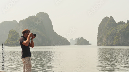 Wallpaper Mural Photographer photographing the nature of Ha Long Bay. Torontodigital.ca