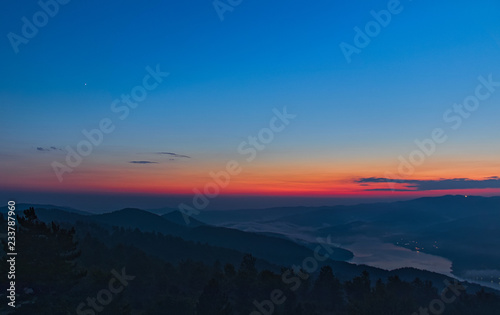 Mountain sunset on the Arvo lake, in the heart of the Sila National Park, Calabria, Italy