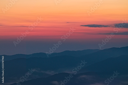 Fototapeta Naklejka Na Ścianę i Meble -  Mountain sunset on the Arvo lake, in the heart of the Sila National Park, Calabria, Italy