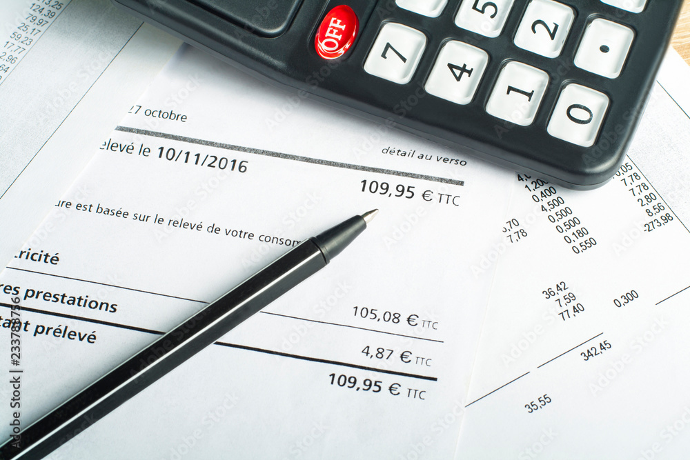 Finance and budget concept. Calculator, pen and accounting document on office table Finance and budget concept. Calculator, pen and accounting document on office table