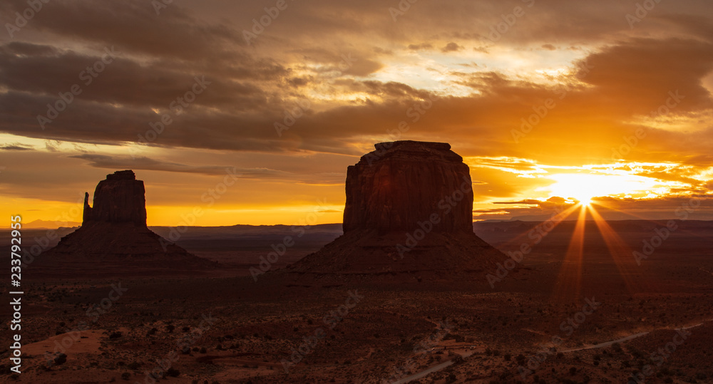 Sunrise over monument valley on cloudy day