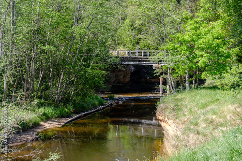 wooden and composite material foot bridge over water