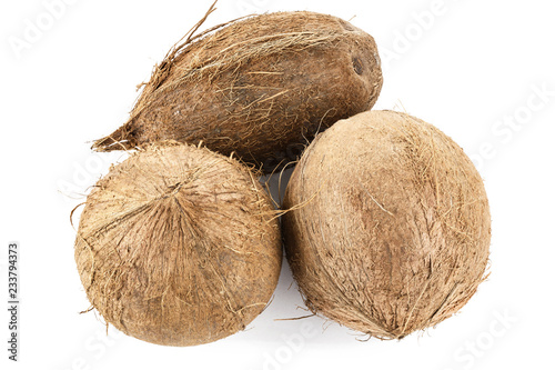 three coconuts on a white background