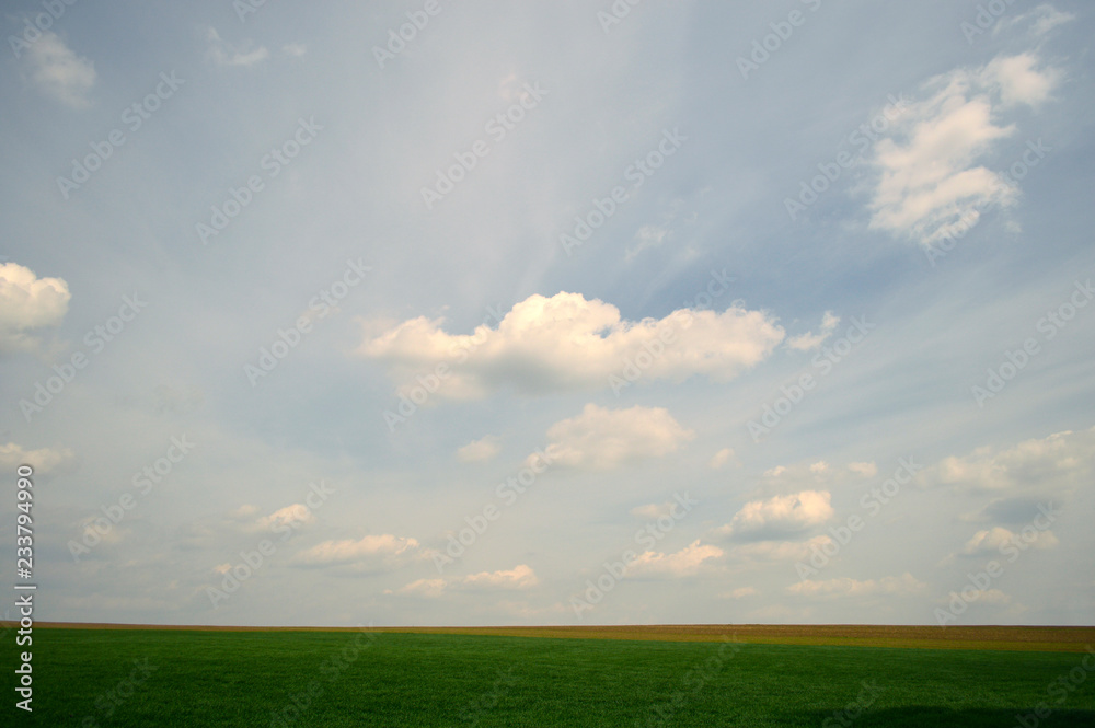 Beautiful textural clouds on a blue sky background