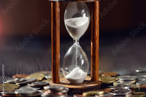 Hourglass as time passing concept for finances investments