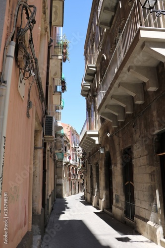 Narrow alley in the old Town Ortigia Syracuse  Sicily Italy 