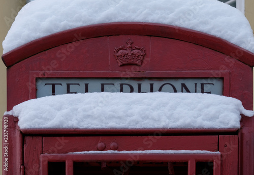 Snow on an English pay phone in the city of Tikhvin.