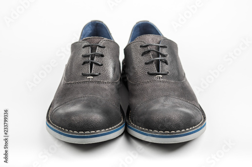 Blue men's shoes on white background.