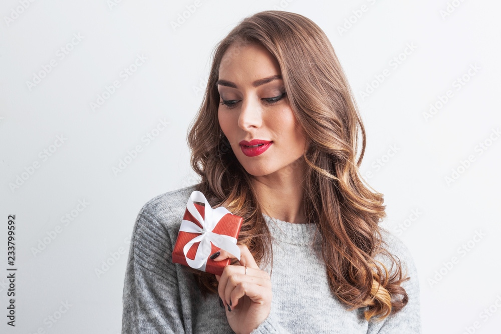 Woman with decorated gift box Woman with decorated gift box