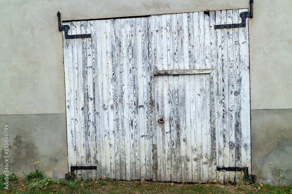 Gates or doors of the farms in the hamlet of Durat in France (Auvergne). Durat was once a factory village belonging to the Pionsat castle. Gates or doors of the farms in the hamlet of Durat in France (Auvergne). Durat was once a factory village belonging to the Pionsat castle.