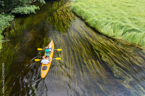 canoe couple yellow leisure river spring summer
