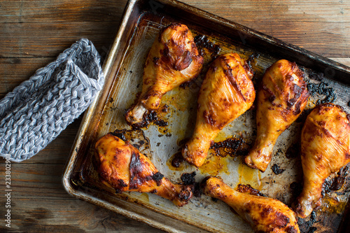 Overhead view of roasted chicken lollipop on baking tray