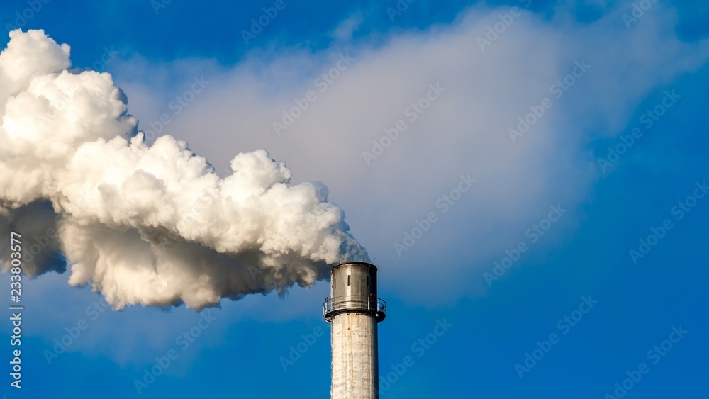 Sugar plant tower Plattling-Bavaria-Germany with steam Sugar plant tower Plattling-Bavaria-Germany with steam
