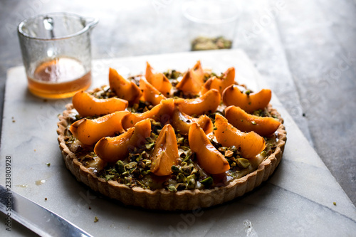 Close up of Apricot Tart with Pistachio and Marzipan Frangipane