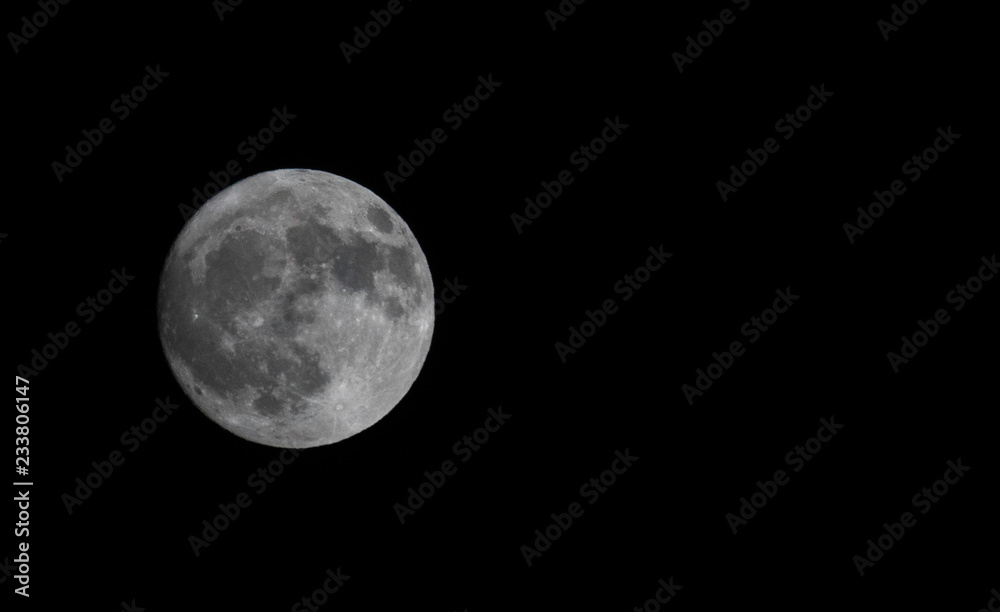 Full moon on dark sky background. Free copy text space. Full moon on dark sky background. Free copy text space.