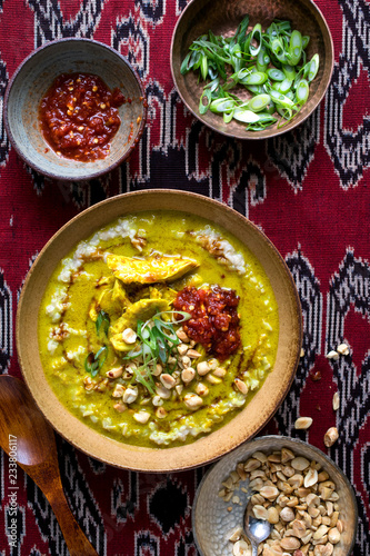 Overhead view of savory rice porridge served in bowl photo