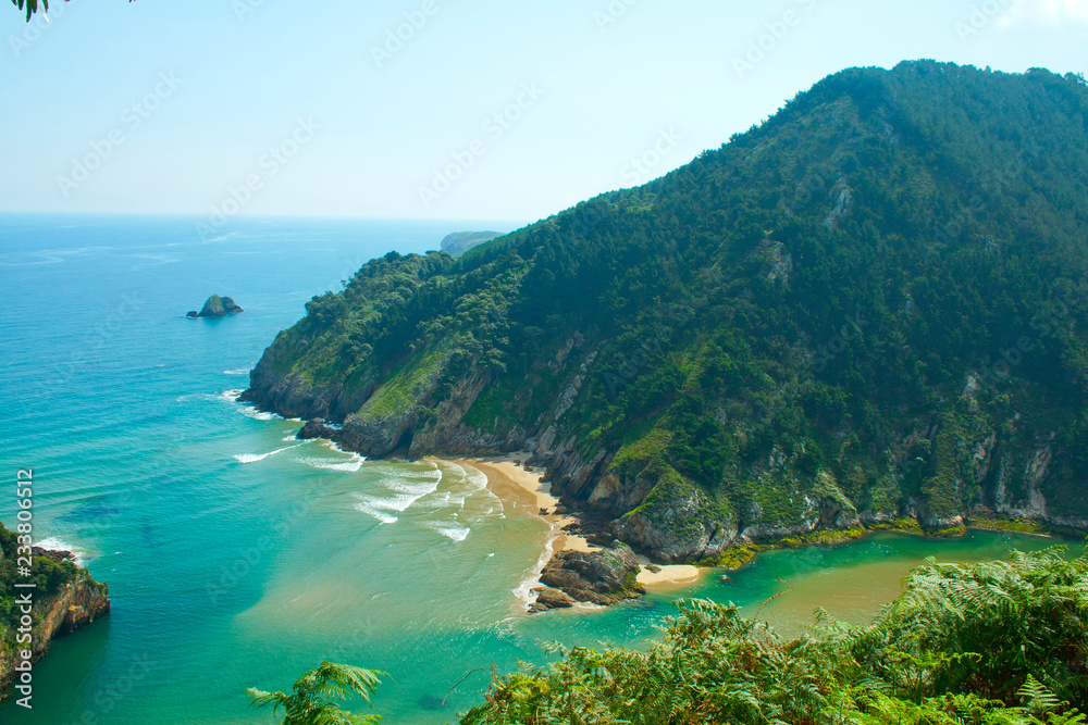 Secluded beach surrounded by amazing cliffs, Estuary of Tina Minor in Cantabria