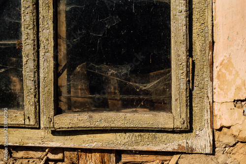 old wooden window on old dirty wall