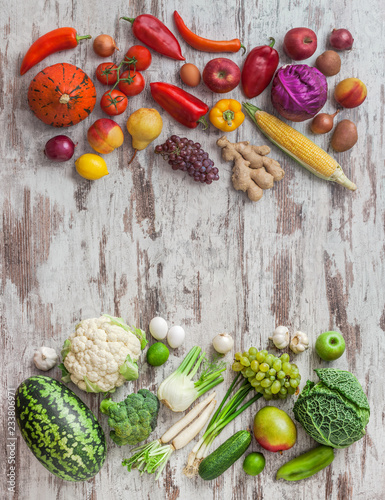 Fruit and vegetables assorted colorful mix overhead arrangement on rustic white table studio shot