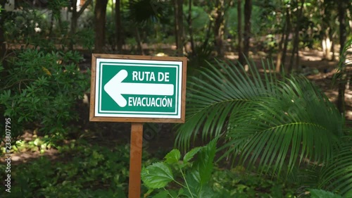 Ruta de Evacuacion sign. Spanish language sign showing evacuation route in event of natural disaster at resort in Quintan Roo, Mexcio.