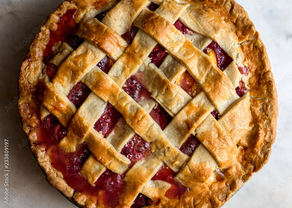 Close up of peach raspberry pie Close up of peach raspberry pie