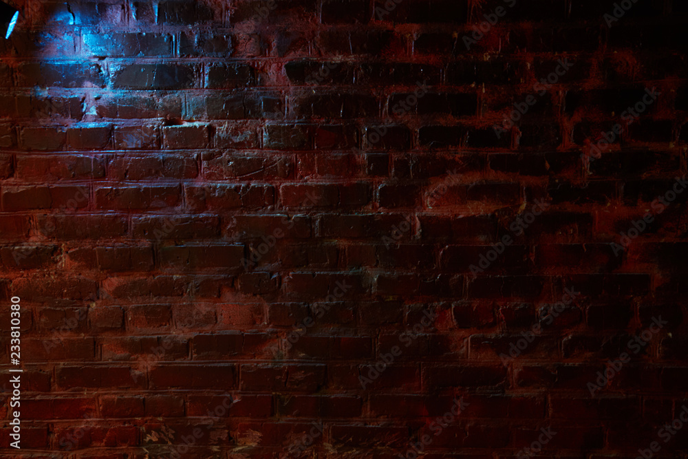 Light blue on a brick wall