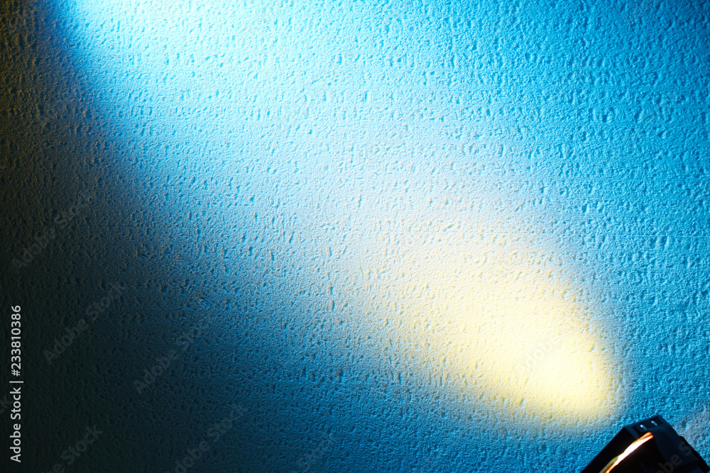 Glare of a yellow lantern on a blue gradient background Glare of a yellow lantern on a blue gradient background