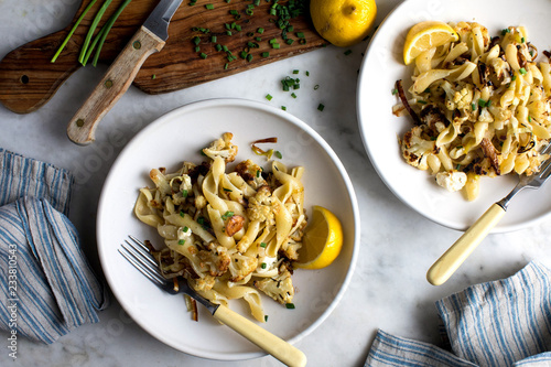 Close of pasta with cauliflower served on plate 