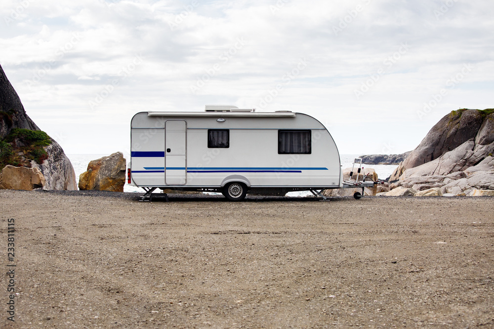 Photo of motorhome on background of mountains ,sky