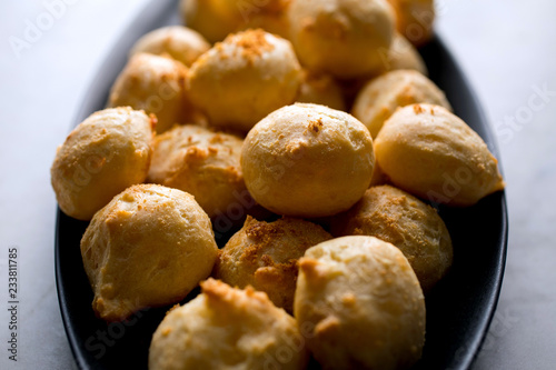 Close up of pancetta and sage gougeres in bowl photo