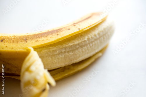 Close up of banana against white background