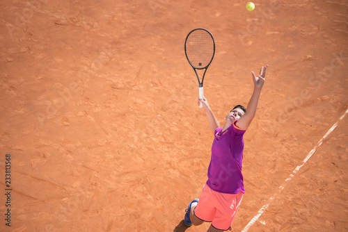 Young tennis player serving the ball © cirkoglu