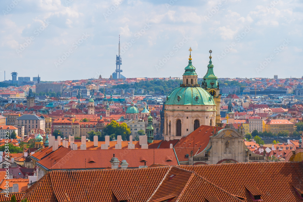View over historic center of Prague, St. Nicholas Church, red roofs of Prague,  Czech republic