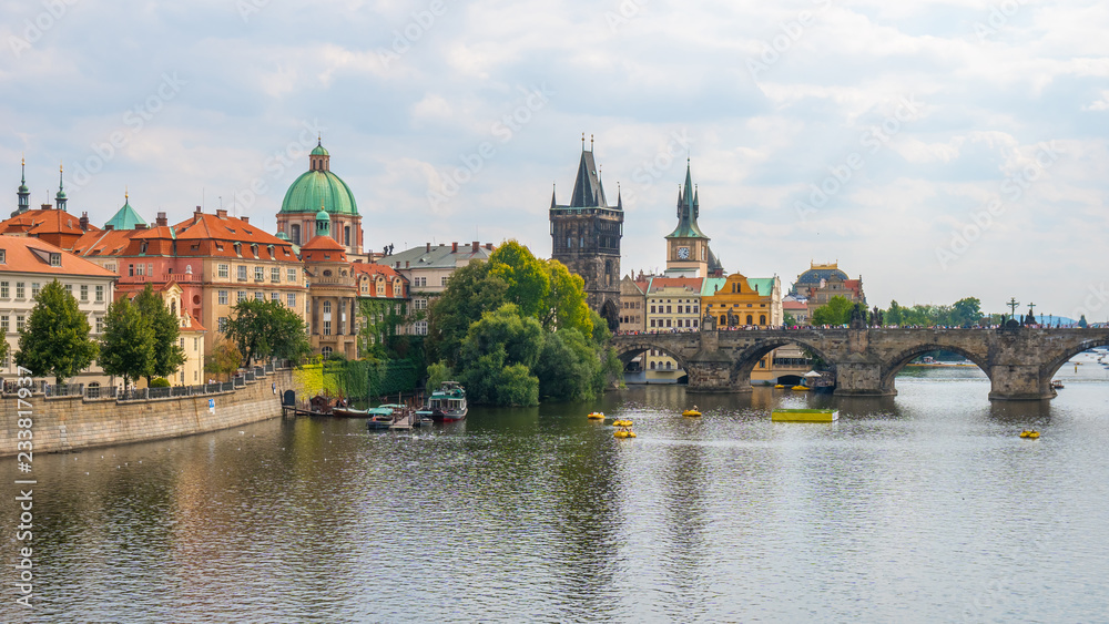 View of the Old Town pier architecture and Charles Bridge over Vltava river in Prague, Czech Republic